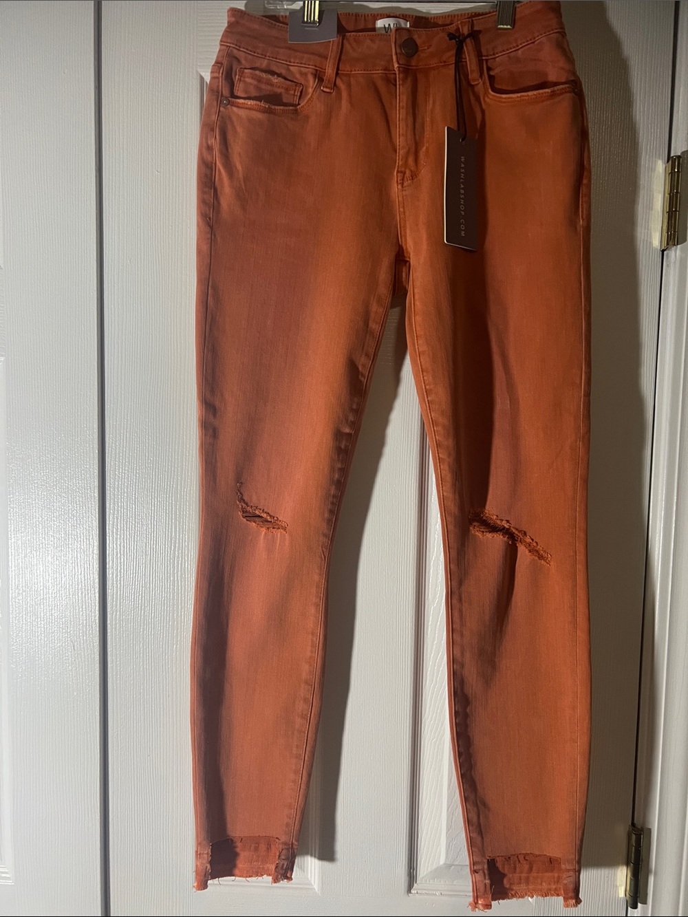 Women's Skinny Distressed Jeans in Rust Orange by